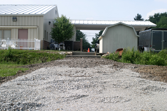 05-27-04  Construction completed on forms for concrete support base for footbridge