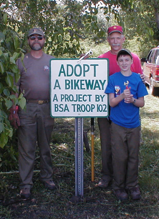 Assistant Scoutmaster Jerry Grigsby, Scoutmaster Casey Elliott, and Life Scout Matt Grigsby