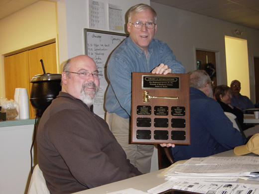 Auctioneer Tim Beathard receives recognition.