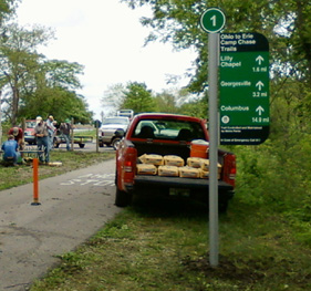 Ohio to Erie Trail signs have been placed at the Wilson Rd Trailhead marking mileage for the Camp Chase Trail into Columbus