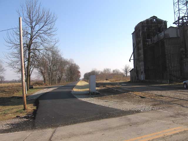 Here we are looking from the crossing of the road with the trail East along the new trail. You can see part of the large grain elevator to the right of the photo.  (Photo: Richard Gehman)