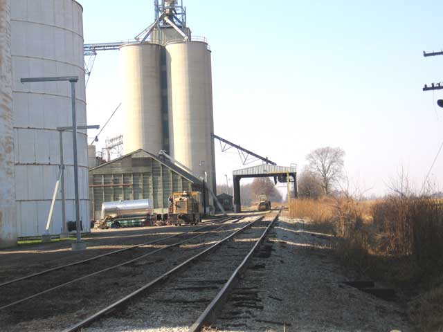 In this photo we are looking West from the same location towards Wilson Road. There is a lot more of the grain elevator shown in this photo. (Photo: Richard Gehman)