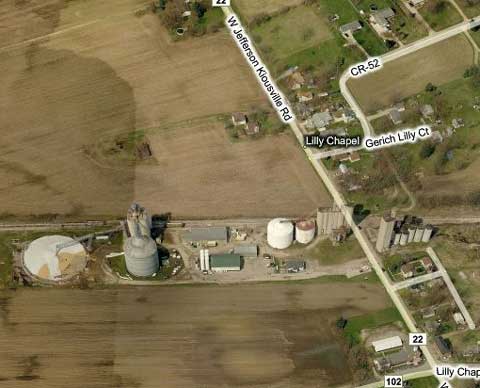 We see here a bird's eye view of the crossing of W. Jefferson Kiousville Road and the trail at Lilly Chapel. As you can see the grain elevator is extensive. (Source: Bing.com)