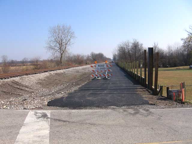 It is 1.92 miles from W. Jefferson Kiousville Road to the trail's crossing of Olmstead Road. Here you can see the construction from Olmstead Road looking East towards the Alkire Road crossing and eventually the town of Georgesville.   (Photo: Richard Gehman)