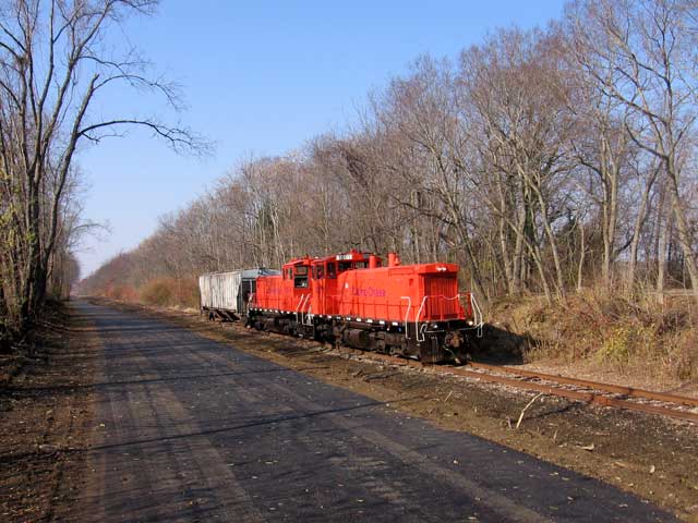 The Camp Chase Railroad Company owns the tracks in this area. While there are not many trains it is harvest time and according to Richard Gehman, this one was carrying grain from the elevator in Lilly Chapel towards Columbus.