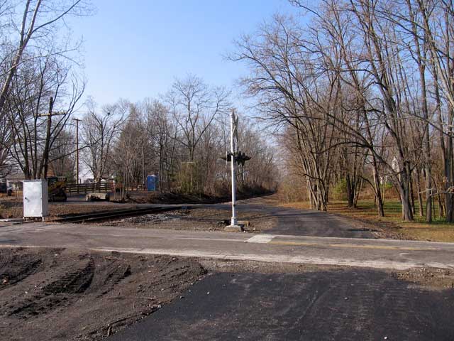 We are now in the town of Georgesville. Here the trail crosses the tracks and goes from the South side of the tracks to the North side.  (Photo: Richard Gehman)